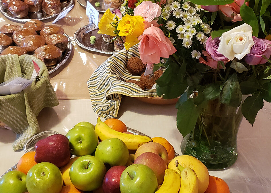 Table of fruit, flowers, food