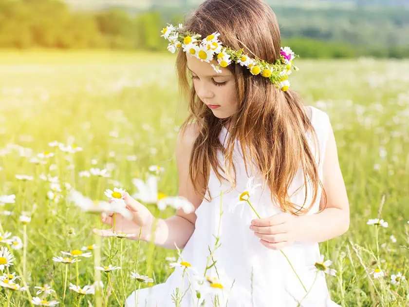 Young Girl in Flower Field