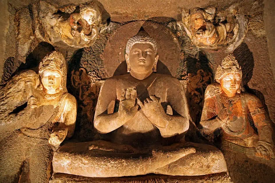 Carved Buddha with Angels in Cave